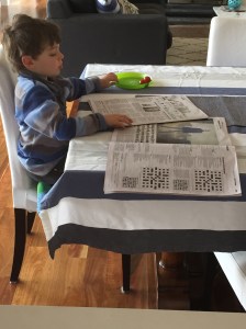 5 year old Hayden 'reading' the paper
